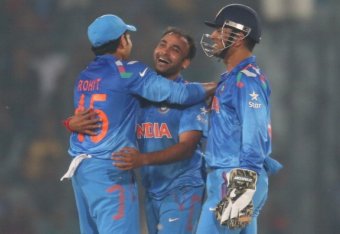 DHAKA, BANGLADESH - MARCH 23:  Amit Mishra celebrates after dismissing Marlon Samuels of the West Indies during the ICC World Twenty20 Bangladesh 2014 match between the West Indies and India at Sher-e-Bangla Mirpur Stadium on March 23, 2014 in Dhaka, Bang