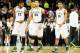 SPOKANE, WA - MARCH 22: Branden Dawson #22 Adreian Payne #5 Denzel Valentine #45 and Gary Harris #14 of the Michigan State Spartans look on in the second half against the Harvard Crimson during the Third Round of the 2014 NCAA Basketball Tournament at Sp