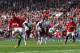 MANCHESTER, ENGLAND - MARCH 29: Wayne Rooney of Manchester United scores his team's second goal from a penalty kick during the Barclays Premier League match between Manchester United and Aston Villa at Old Trafford on March 29, 2014 in Manchester, Englan