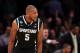 NEW YORK, NY - MARCH 28: Adreian Payne #5 of the Michigan State Spartans reacts after hitting a three pointer late in the game against Virginia Cavaliers during the regional semifinal of the 2014 NCAA Men's Basketball Tournament at Madison Square Garden