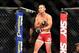 Sep 4, 2013; Belo Horizonte, BRAZIL; Yushin Okami (red shorts) enters his fight against Ronaldo Jacare Souza (not pictured) during UFC Fight Night at Mineirinho Arena. Mandatory Credit: Jason Silva-USA TODAY Sports