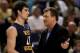 PHOENIX - MARCH 27: Head coach Bob Huggins of West Virginia Mountaineers talks to player Joe Alexander #11 during the first half of the West Regional Sweet 16 game against the Xavier Musketeers at the U.S. Airways Center on March 27, 2008 in Phoenix, Ari