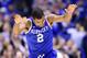 Mar 30, 2014; Indianapolis, IN, USA; Kentucky Wildcats guard Aaron Harrison (2) reacts after making a basket against the Michigan Wolverines in the second half of the finals of the midwest regional of the 2014 NCAA Mens Basketball Championship tournament