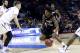 Mar 21, 2014; San Antonio, TX, USA; Louisiana Lafayette Ragin Cajuns guard Elfrid Payton (2) drives against Creighton Bluejays guard Grant Gibbs (10) in the first half of a men's college basketball game during the second round of the 2014 NCAA Tournament