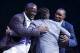 Mar 28, 2014; Auburn Hills, MI, USA; Detroit Pistons owner Tom Gores greats former players Isiah Thomas (right) and Joe Dumars president of basketball operations (left) during a half-time celebration for the 1989 NBA championship team at The Palace of A
