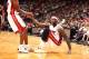 MIAMI, FL - MARCH 24: Ray Allen #34 helps up LeBron James #6 of the Miami Heat during the game against the Portland Trail Blazers on March 24, 2014 at American Airlines Arena in Miami, Florida. NOTE TO USER: User expressly acknowledges and agrees that,