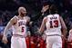 Mar 13, 2014; Chicago, IL, USA; Chicago Bulls forward Carlos Boozer (5) reacts with center Joakim Noah (13) during the second half at the United Center. Chicago defeats Houston 111-87. Mandatory Credit: Mike DiNovo-USA TODAY Sports