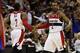 Dec 28, 2013; Washington, DC, USA; Washington Wizards point guard John Wall (2) celebrates with Wizards shooting guard Bradley Beal (3) against the Detroit Pistons in the second quarter at Verizon Center. The Wizards won 102-86. Mandatory Credit: Geoff Bu