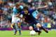 GLASGOW, SCOTLAND - JULY 26 : Kensuke Nagai of Japan clashes with Inigo Martinez of Spain during the Men's Football first round Group D Match of the London 2012 Olympic Games between Spain and Japan at Hampden Park on July 26, 2012 in Glasgow, Scotland.