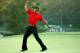 AUGUSTA, GA - APRIL 10: Tiger Woods celebrates after sinking a putt on the first playoff hole to win the 2005 Masters on April 10, 2005 at Augusta National Golf Course in Augusta, Georgia. (Photo By Jamie Squire/Getty Images for Golfweek)