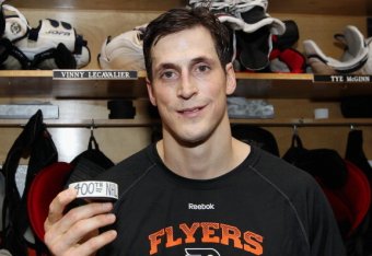 PHILADELPHIA, PA - MARCH 30: Vincent Lecavalier #40 of the Philadelphia Flyers poses with his 400th NHL goal puck after his game against the Boston Bruins on March 30, 2014 at the Wells Fargo Center in Philadelphia, Pennsylvania. The Bruins went on to def
