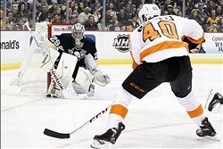 Mar 16, 2014; Pittsburgh, PA, USA; Pittsburgh Penguins goalie Marc-Andre Fleury (29) guards the net against Philadelphia Flyers center Vincent Lecavalier (40) during the first period at the CONSOL Energy Center.The Flyers won 4-3. Mandatory Credit: Charl