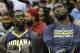 Mar 30, 2014; Cleveland, OH, USA; Indiana Pacers guard Lance Stephenson (left) and center Roy Hibbert (55) react on the bench in the fourth quarter against the Cleveland Cavaliers at Quicken Loans Arena. Mandatory Credit: David Richard-USA TODAY Sports