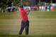 DORAL, FL - MARCH 09: Tiger Woods plays a bunker shot on the fifth hole during the final round of the World Golf Championships-Cadillac Championship at Trump National Doral on March 9, 2014 in Doral, Florida. (Photo by Chris Trotman/Getty Images)