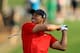 AUGUSTA, GA - APRIL 10: Tiger Woods hits a shot during the final round of the 2011 Masters Tournament on April 10, 2011 in Augusta, Georgia. (Photo by David Cannon/Getty Images)