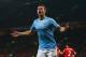 MANCHESTER, ENGLAND - MARCH 25: Edin Dzeko of Manchester City celebrates scoring the second goal during the Barclays Premier League match between Manchester United and Manchester City at Old Trafford on March 25, 2014 in Manchester, England. (Photo by A