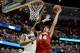 ANAHEIM, CA - MARCH 29: Frank Kaminsky #44 of the Wisconsin Badgers goes up for a shot over Rondae Hollis-Jefferson #23 of the Arizona Wildcats in overtime during the West Regional Final of the 2014 NCAA Men's Basketball Tournament at the Honda Center on
