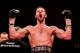 CARDIFF, WALES - AUGUST 17: Enzo Maccarinelli celebrates his victory over Ovill McKenzie during their Commonwealth Light-Heavyweight Championship bout at Motorpoint Arena on August 17, 2013 in Cardiff, Wales. (Photo by Scott Heavey/Getty Images)