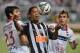 BELO HORIZONTE, BRAZIL - MARCH 19: Fabian Balbuena of Nacional and Ronaldinho Gaucho of Atletico during the match between Atletico MG v Nacional for the Copa Briedgestone Libertadores 2014 at Independencia Stadium on March 19, 2014 in Belo Horizonte, Braz