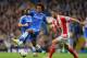 LONDON, ENGLAND - APRIL 05: Marc Wilson of Stoke City closes down Willian of Chelsea during the Barclays Premier League match between Chelsea and Stoke City at Stamford Bridge on April 5, 2014 in London, England. (Photo by Mike Hewitt/Getty Images)