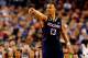 ARLINGTON, TX - APRIL 05: Shabazz Napier #13 of the Connecticut Huskies gestures during the NCAA Men's Final Four Semifinal against the Florida Gators at AT&T Stadium on April 5, 2014 in Arlington, Texas. (Photo by Tom Pennington/Getty Images)