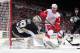 DETROIT, MI - MARCH 20: Marc-Andre Fleury #29 of the Pittsburgh Penguins makes a save as Tomas Tatar #21 of the Detroit Red Wings looks for the rebound during an NHL game on March 20, 2014 at Joe Louis Arena in Detroit, Michigan. (Photo by Dave Reginek/N