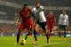 LONDON, ENGLAND - DECEMBER 15: Raheem Sterling of Liverpool and Ezekiel Fryers of Tottenham Hotspur compete for the ball during the Barclays Premier League match between Tottenham Hotspur and Liverpool at White Hart Lane on December 15, 2013 in London, En