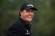 AUGUSTA, GA - APRIL 08: Phil Mickelson of the United States waits on the putting green during a practice round prior to the start of the 2014 Masters Tournament at Augusta National Golf Club on April 8, 2014 in Augusta, Georgia. (Photo by Andrew Redingt