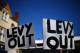 LONDON, ENGLAND - MARCH 16: A sign saying 'Levy Out' is seen in protest of Daniel Levy, Tottenham Hotspur Chairman ahead of the Barclays Premier League match between Tottenham Hotspur and Arsenal at White Hart Lane on March 16, 2014 in London, England.