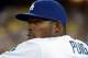 Apr 6, 2014; Los Angeles, CA, USA; Los Angeles Dodgers right fielder Yasiel Puig (66) watches from the dugout during the game against the San Francisco Giants at Dodger Stadium. The Dodgers defeated the Giants 6-2. Mandatory Credit: Kirby Lee-USA TODAY Sp
