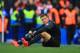LONDON, ENGLAND - MARCH 22: A dejected Wojciech Szczesny of Arsenal sits on the pitch after conceding a fourth goal during the Barclays Premier League match between Chelsea and Arsenal at Stamford Bridge on March 22, 2014 in London, England. (Photo by R