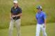 GULLANE, SCOTLAND - JULY 17: Rory McIlroy of Northern Ireland and Jordan Spieth of the United States walk along the fairway ahead of the 142nd Open Championship at Muirfield on July 17, 2013 in Gullane, Scotland. (Photo by Stuart Franklin/Getty Images)