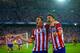 MADRID, SPAIN - APRIL 09: Koke of Club Atletico de Madrid celebrates scoring the opening goal with David Villa of Club Atletico de Madrid during the UEFA Champions League Quarter Final second leg match between Club Atletico de Madrid and FC Barcelona at