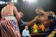 Jun 29, 2013; Mashantucket, CT, USA; Super Middleweights Thomas Oosthuizen (white trunks) and Brandon Gonzales (blue trunks) box during their bout at Foxwoods Resort and Casino-MGM Grand Theatre. The fight ended in a draw. Mandatory Credit: Joe Camporeal