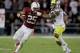 PALO ALTO, CA - NOVEMBER 07: Tyler Gaffney #25 of the Stanford Cardinal is tackled by Brian Jackson #12 of the Oregon Ducks at Stanford Stadium on November 7, 2013 in Palo Alto, California. (Photo by Ezra Shaw/Getty Images)