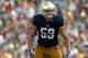 SOUTH BEND, IN - AUGUST 31: Jarrett Grace #59 of the Notre Dame Fighting Irish awaits the snap against the Temple Owls at Notre Dame Stadium on August 31, 2013 in South Bend, Indiana. Notre Dame defeated Temple 28-6. (Photo by Jonathan Daniel/Getty Images