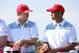 Oct 1, 2013; Dublin, OH, USA; Tiger Woods (right) with Jordan Spieth (left) of the U.S. Team during a photo call on the practice ground prior to the start of The Presidents Cup at Muirfield Village Golf Club. Mandatory Credit: Allan Henry-USA TODAY Sport
