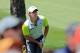 AUGUSTA, GA - APRIL 13: Rory McIlroy of Northern Ireland watches a shot from the rough during the final round of the 2014 Masters Tournament at Augusta National Golf Club on April 13, 2014 in Augusta, Georgia. (Photo by David Cannon/Getty Images)