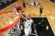 NEW YORK, NY - MARCH 19: Marcus Thornton #10 of the Brooklyn Nets shoots against the Charlotte Bobcats at the Barclays Center on March 19, 2014 in the Brooklyn borough of New York City in New York City. NOTE TO USER: User expressly acknowledges and agrees