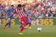 GETAFE, SPAIN - APRIL 13: Diego Costa (#19) of Club Atletico de Madrid takes a penalty kick during the La Liga match between Getafe CF and Club Atletico de Madrid at Coliseum Alfonso Perez stadium on April 13, 2014 in Getafe, Spain. The penalty was saved