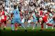 MANCHESTER, ENGLAND - MAY 13: Sergio Aguero of Manchester City scores his team's third and matchwinning goal during the Barclays Premier League match between Manchester City and Queens Park Rangers at the Etihad Stadium on May 13, 2012 in Manchester, Eng