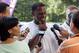Minnesota Vikings safety Darren Sharper talks with reporters at training camp in Mankato, Minn., on July 29, 2005.