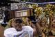 Saints safety Darren Sharper holds the George Halas Trophy after winning the NFC Championship game on Jan. 24, 2010.