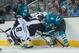 Jan 27, 2014; San Jose, CA, USA; San Jose Sharks center Joe Thornton (19) checks Los Angeles Kings defenseman Drew Doughty (8) as center Trevor Lewis (22) and San Jose Sharks center Joe Pavelski (8) fight for possession of the puck during the second perio