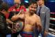 LAS VEGAS, NV - APRIL 12: Manny Pacquiao celebrates his victory over Timothy Bradley at the MGM Grand Garden Arena on April 12, 2014 in Las Vegas, Nevada. (Photo by Jeff Gross/Getty Images)