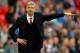 LONDON, ENGLAND - APRIL 12: Arsene Wenger, manager of Arsenal signals during the FA Cup Semi-Final match between Wigan Athletic and Arsenal at Wembley Stadium on April 12, 2014 in London, England. (Photo by Mike Hewitt/Getty Images)
