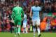 LIVERPOOL, ENGLAND - APRIL 13: Vincent Kompany of Manchester City looks dejected at the end of the Barclays Premier League match between Liverpool and Manchester City at Anfield on April 13, 2014 in Liverpool, England. (Photo by Alex Livesey/Getty Image