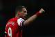 LONDON, ENGLAND - APRIL 15: Lukas Podolski of Arsenal celebrates as he scores their third goal during the Barclays Premier League match between Arsenal and West Ham United at Emirates Stadium on April 15, 2014 in London, England. (Photo by Paul Gilham/G