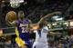 Apr 2, 2014; Sacramento, CA, USA; Los Angeles Lakers guard Jodie Meeks (20) scores a layup against Sacramento Kings forward Rudy Gay (8) during the first quarter at Sleep Train Arena. Mandatory Credit: Kelley L Cox-USA TODAY Sports