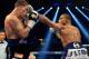 May 4, 2013; Las Vegas, NV, USA; J'Leon Love (white gloves) and Gabriel Rosado (black gloves) during their NABF Middleweight title fight at the MGM Grand Garden Arena. Love won. Mandatory Credit: Jayne Kamin-Oncea-USA TODAY Sports